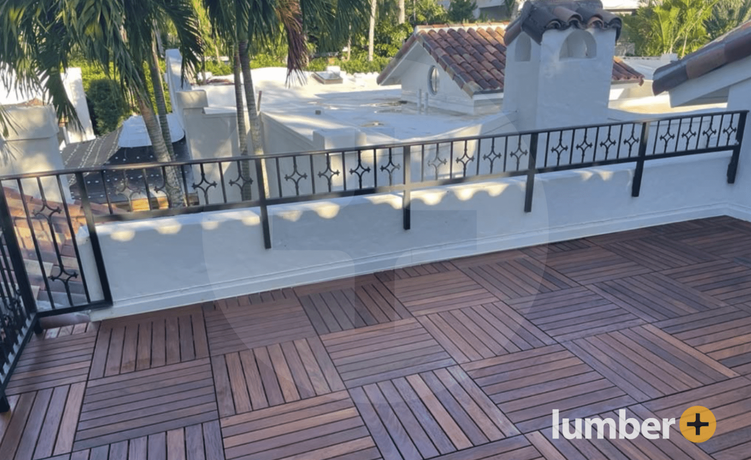 an image of rooftop deck with Ipe wood deck tiles from Lumber Plus