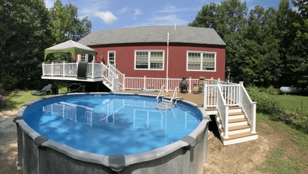 An image of a multi-level deck features a shaded lounge for relaxing in style.