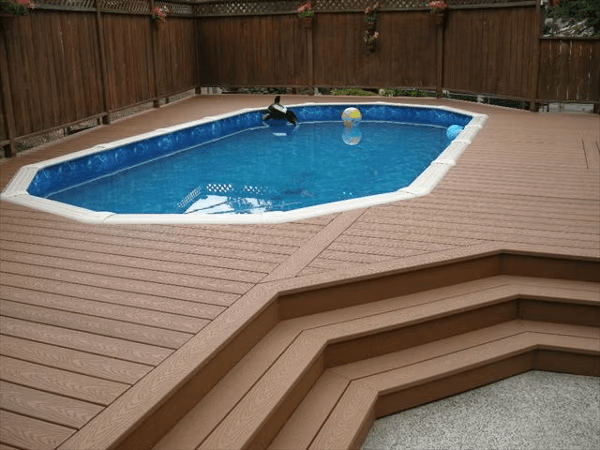 Tiered entry deck with privacy fencing for added seclusion and style.