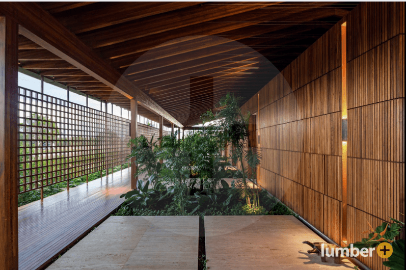 An image of an outdoor retreat clad with wood siding. 