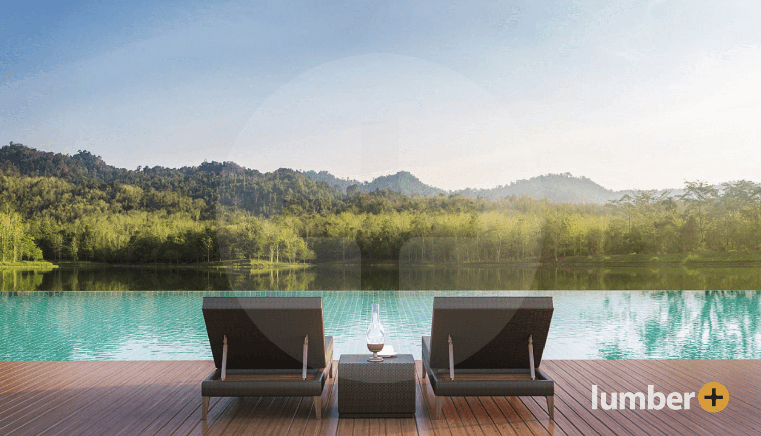 Wood pool deck next to an infinity pool overlooking the forest.