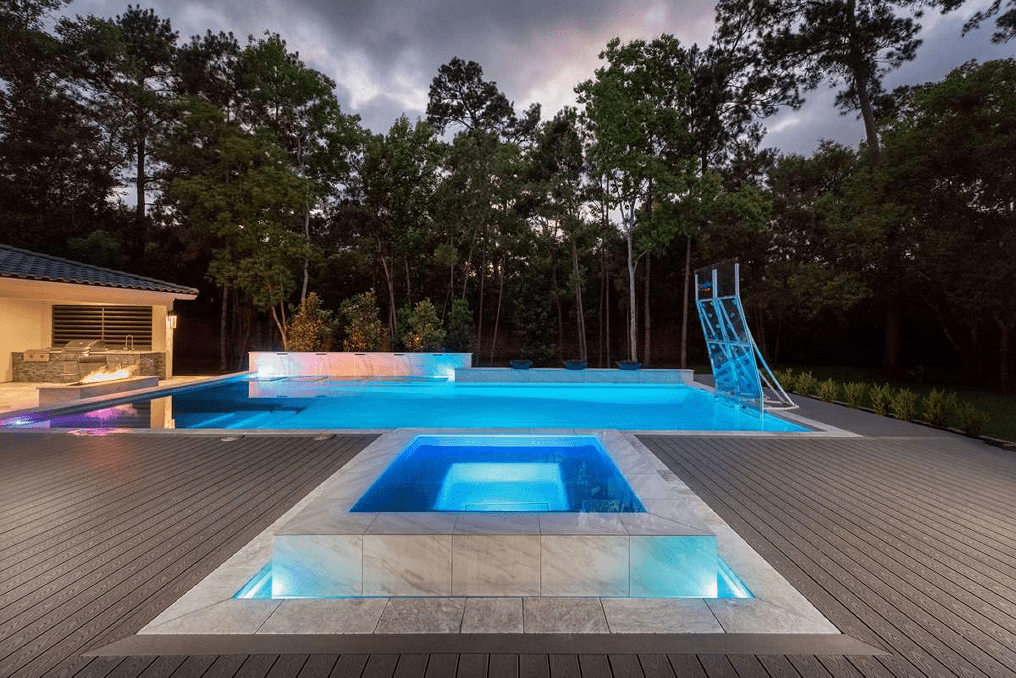 Trex pool deck in Pebble Gray, offering a cool, modern look with a soft gray shade.