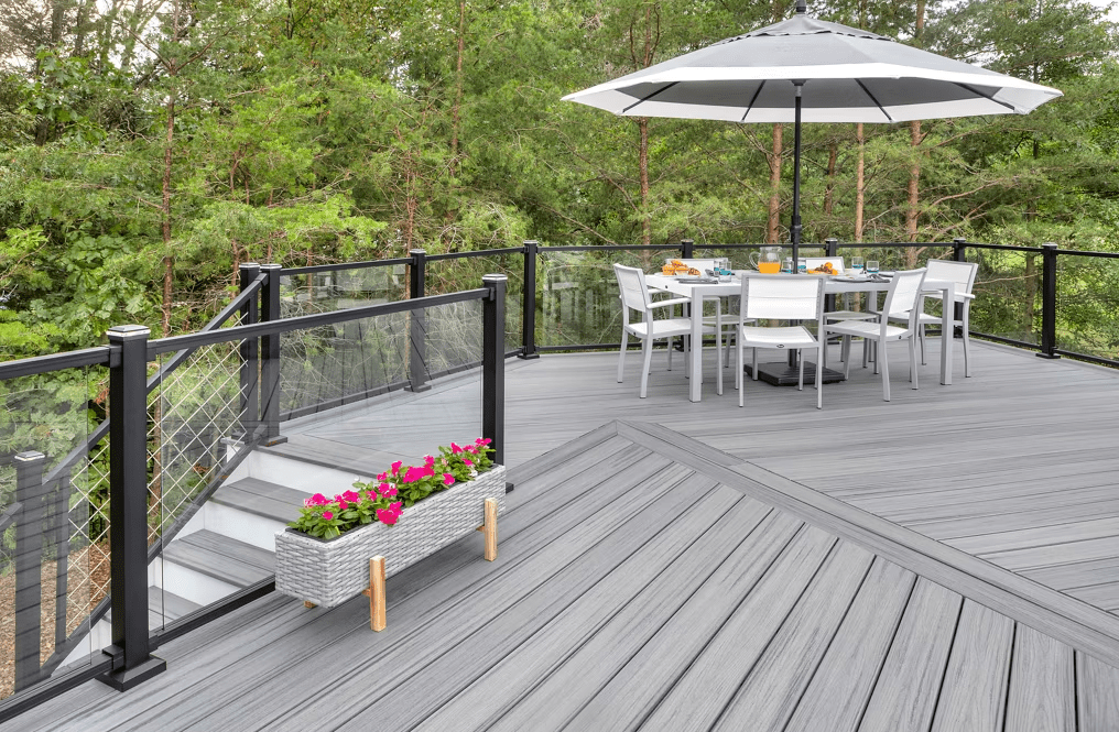 A Trex Transcend® deck in Island Mist, with weathered silver-gray tones.