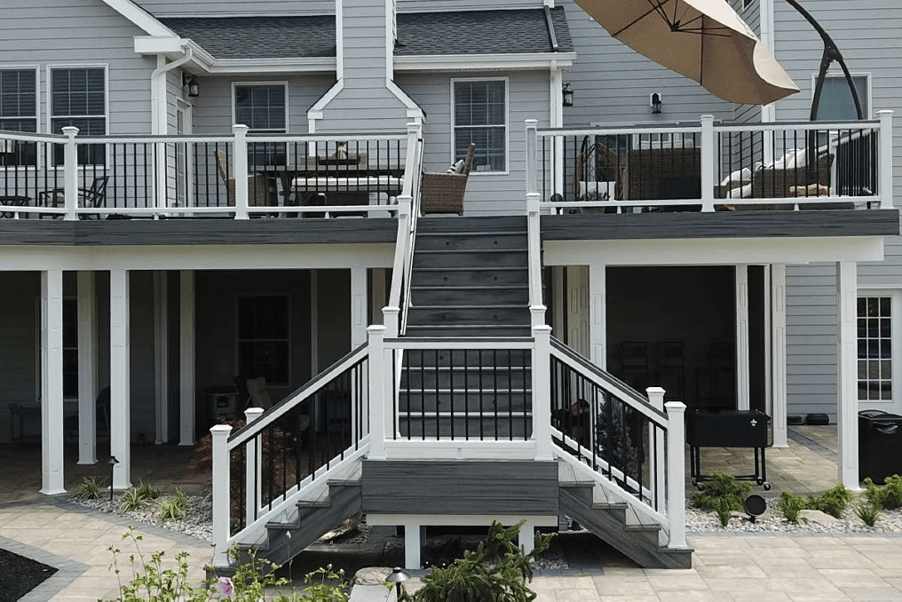 Two-way stair entry for flowing between yard and driveway.