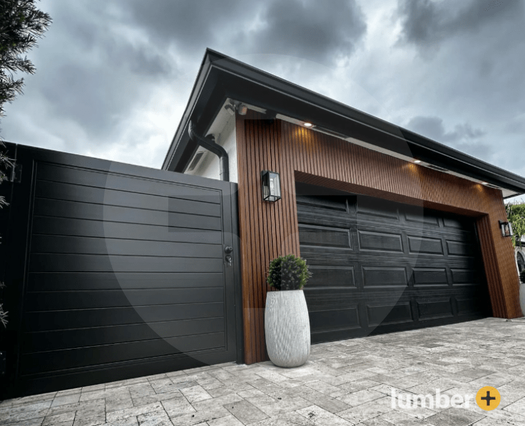 Dark wood cladding on the exterior walls of a garage.