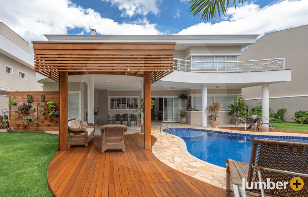 Backyard floating deck idea with patio furniture and pool