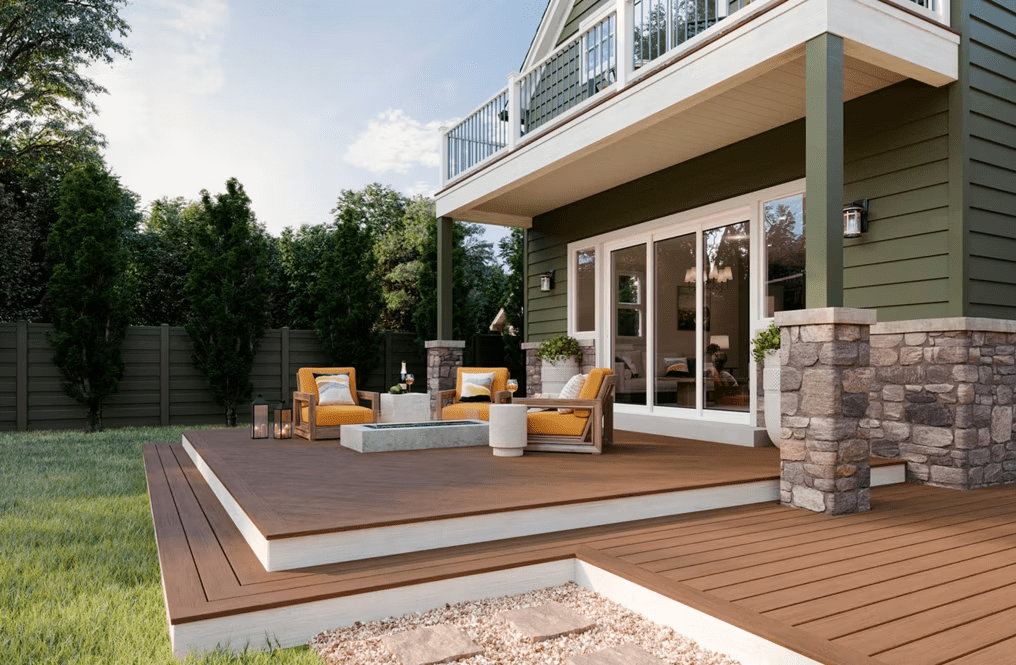 A multi-stepped patio made with Trex composite materials and stone accents.
