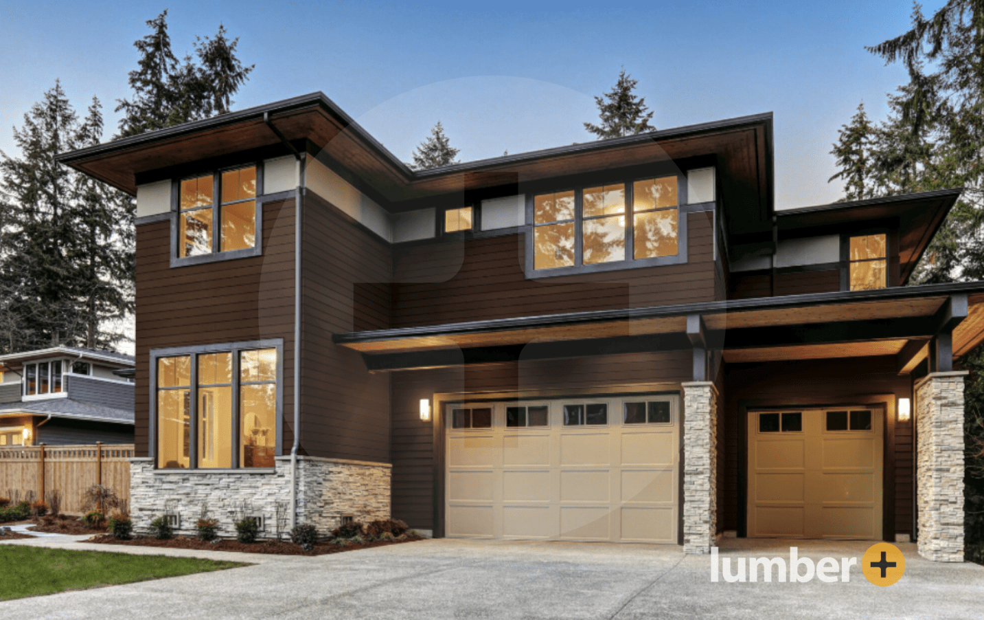 Dark wood cladding on the exterior of a house with a two car garage.