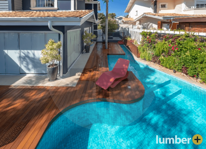 outdoor floating deck that curves around a pool