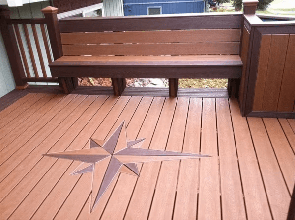 Image of a two-toned Trex deck design with a star like design in tones of brown.