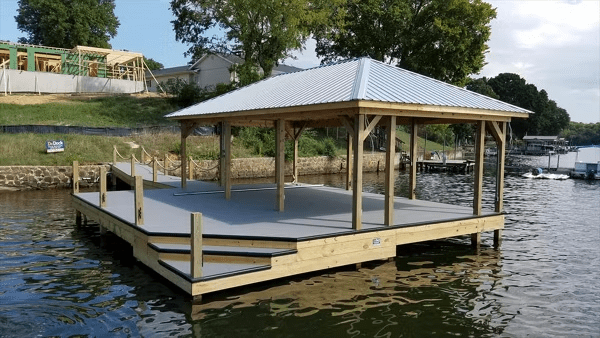 Floating Trex deck with a covered area for shaded entertaining and all-weather enjoyment.