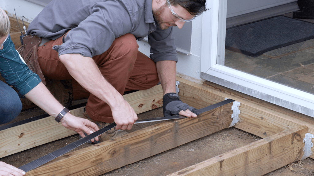 Image of the install of joist spacing for Trex decking.