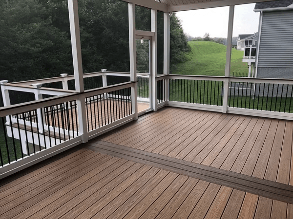 A large two-toned deck design in shades of brown.