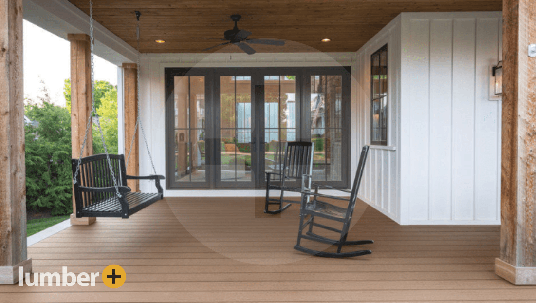 Light brown deck with PVC decking with a black wooden swing and black wooden furniture.