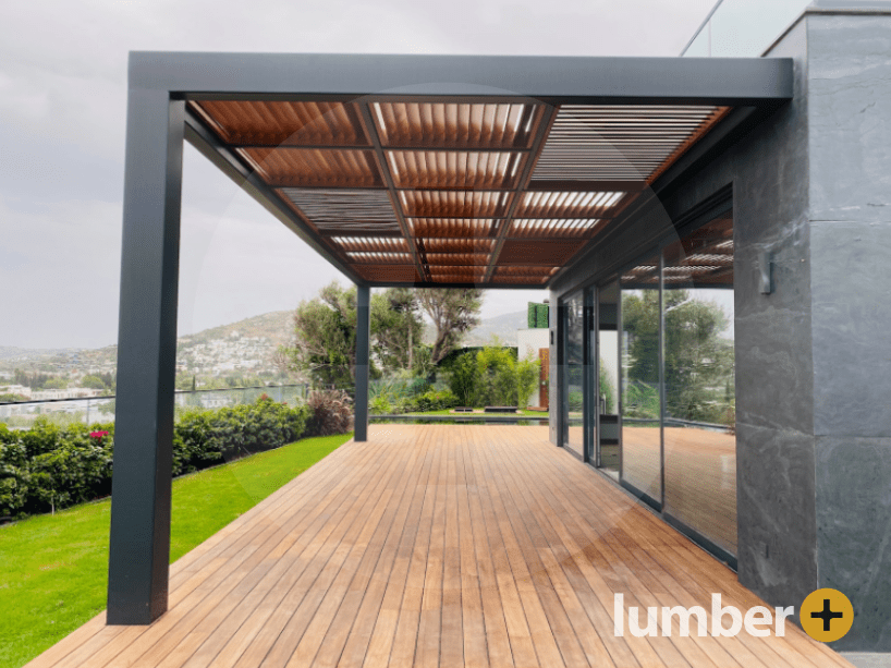 Caption: A fire-resistant deck underneath a modern wooden pergola.