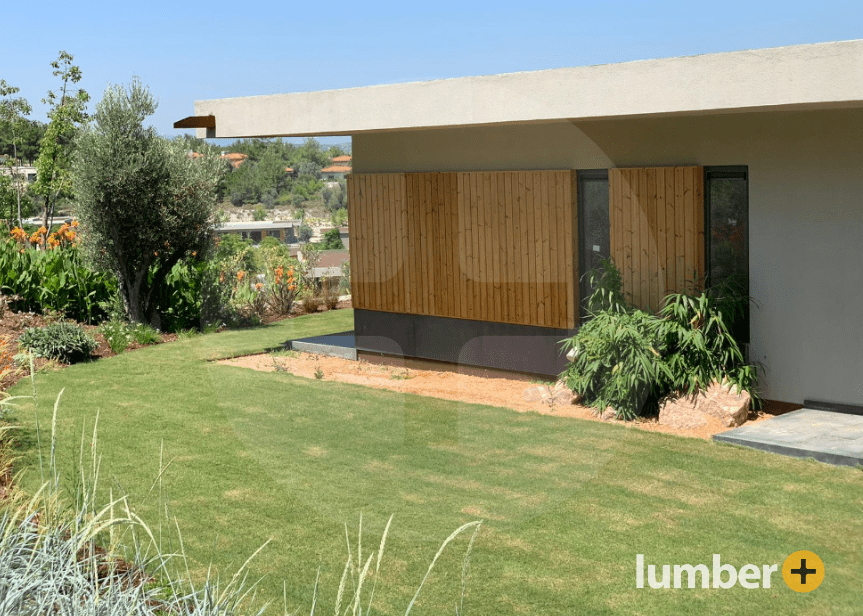 Thermo Pine wood cladding on the exterior walls of a house.