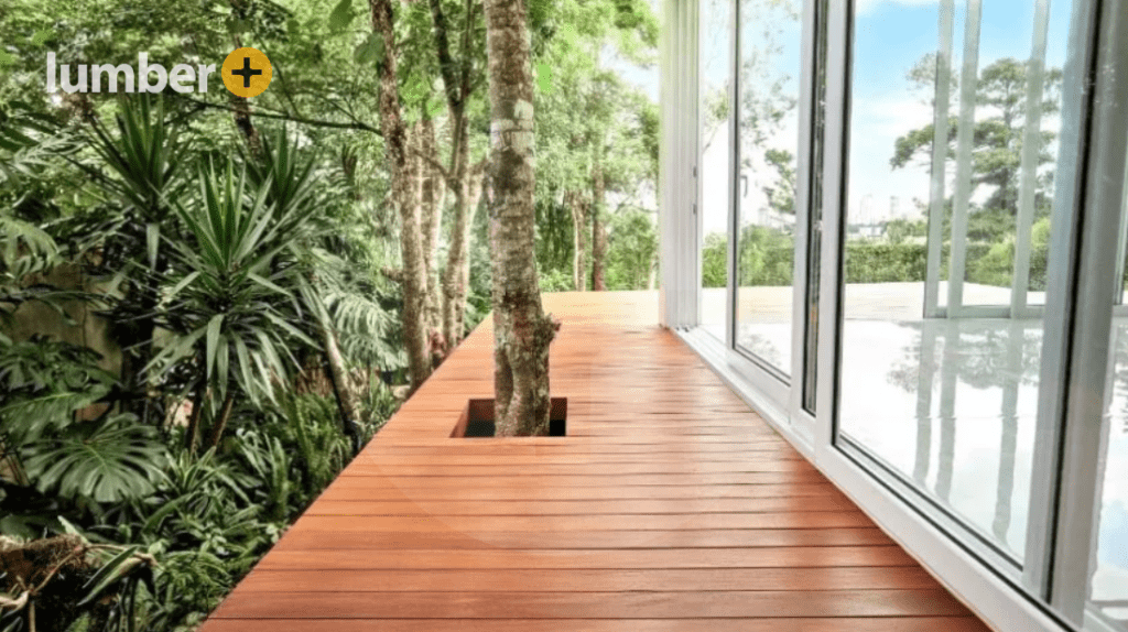 Hardwood decking next to large windows in the jungle