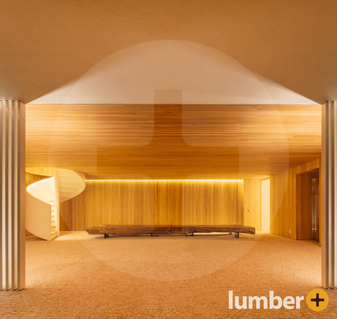 Interior room with spiral staircase and finely crafted wood panels