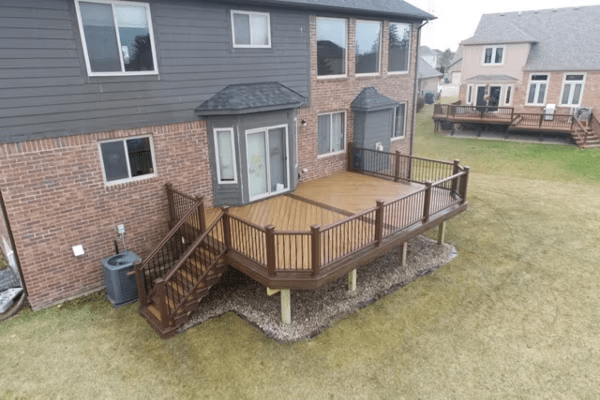 A large deck in two-toned brown colors.