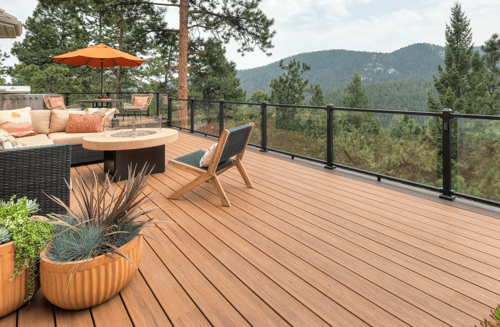 A Trex Transcend® deck in Tiki Torch a Trex decking color, with warm golden tones.