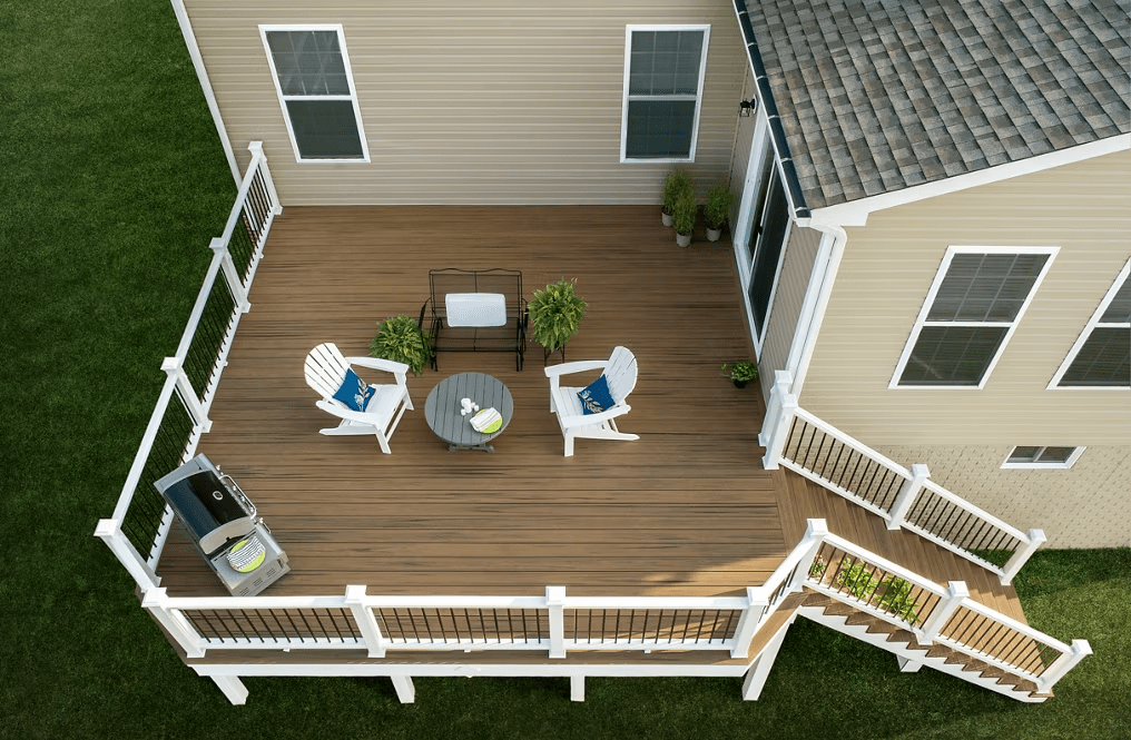 A Trex Enhance® deck in Toasted Sand, featuring warm golden beige tones.