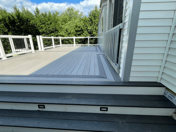 A two-toned Trex deck in grays.