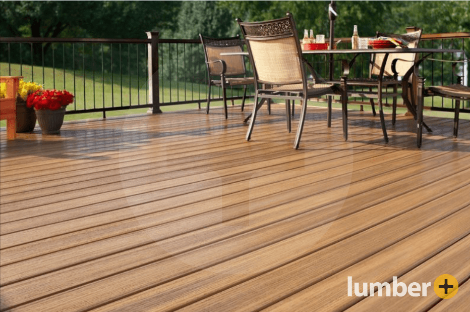 Outdoor composite deck overlooking a large grass field.