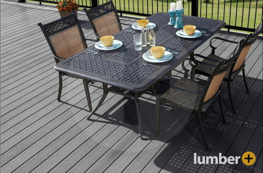 Gray deck composite decking Fiberon® materials and an outdoor metal dining table.