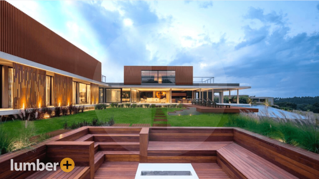 Modern home featuring vertical timber rainscreen facade design.