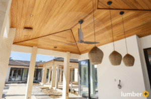 Outdoor patio with wood ceiling cladding showcasing architectural design styles.
