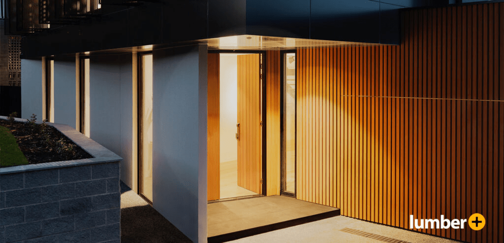 Warm wood slat cladding on a modern exterior wall.