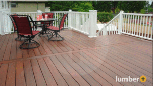 An image of a wood deck with white railing.