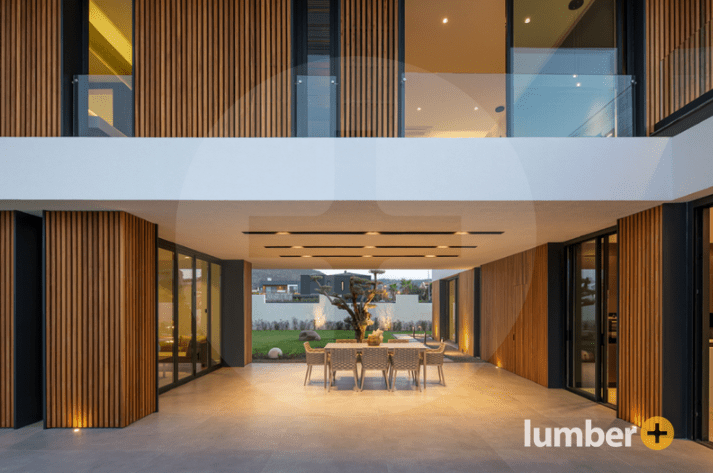 An image of an entryway covered in wood paneling.