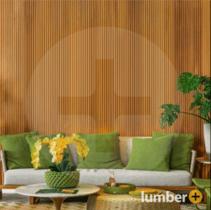 Wood paneling behind a sofa with green pillows. 