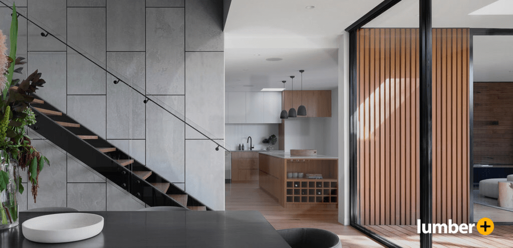 Indoor space featuring wood accent wall ideas and a glass divider.