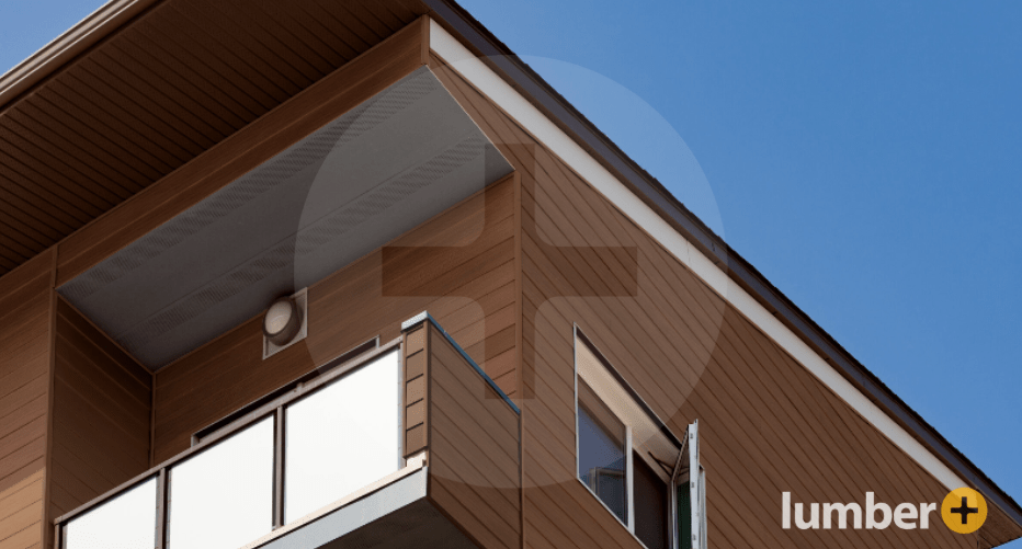 An image of a modern building exterior with horizontal wood siding and a balcony.