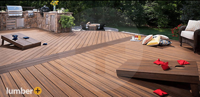 An image of a large deck made of thermally modified ash with outdoor seating and games.