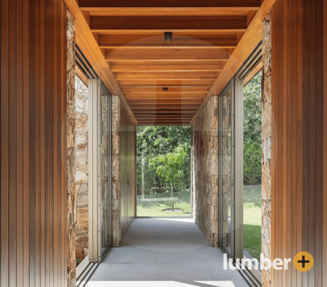 A hallway with wood slat siding.