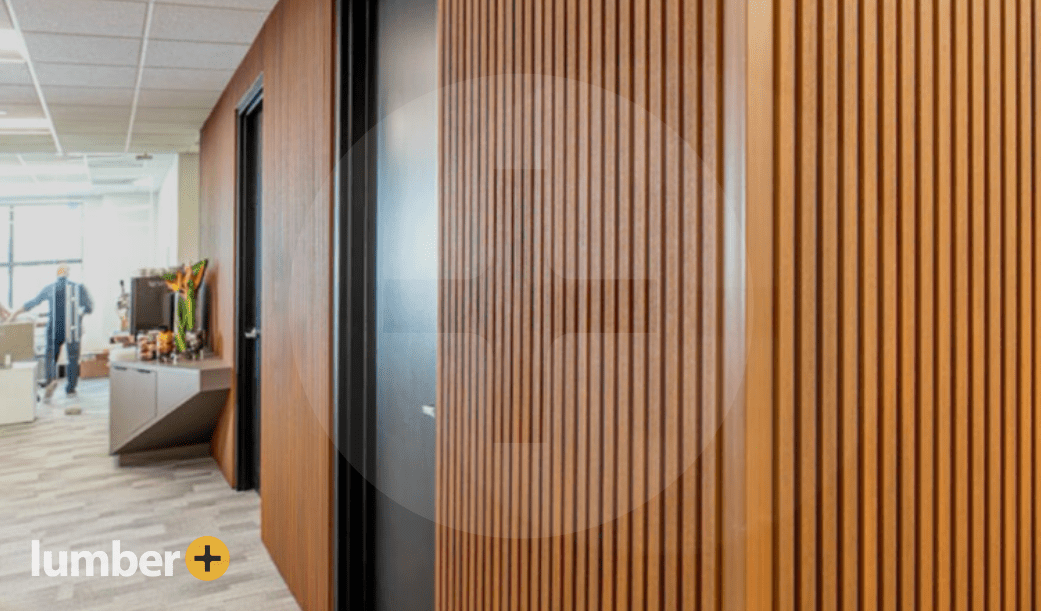 Wood cladding panels inside an office space. 