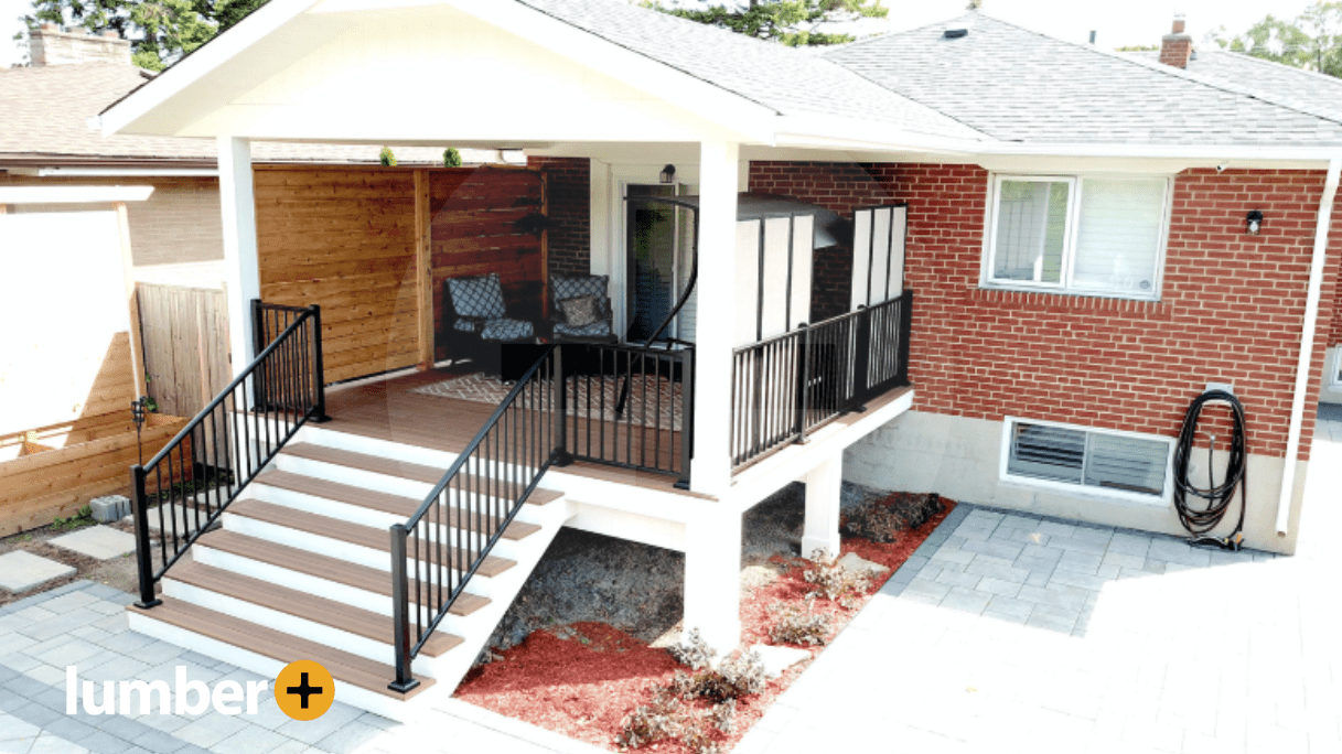 Wooden privacy panels on a small suburban back patio.